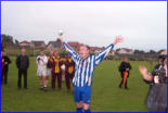 Skipper Craig Dick holds up the Supplementary Cup 2003